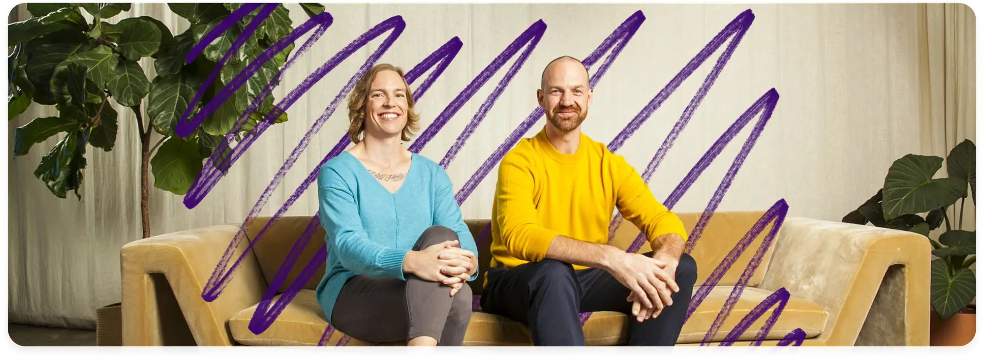 Portrait of Plume’s co-founders sitting on a sofa